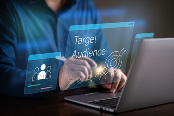 Target Audience concept , target marketing , man using laptop to analyze data  to find a target...
