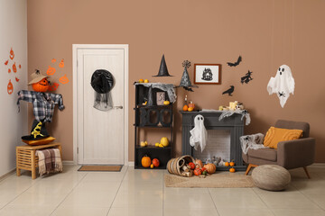 Interior of living room decorated for Halloween with door and mantelpiece