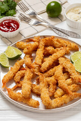 deep fried panko breaded shrimp on a plate