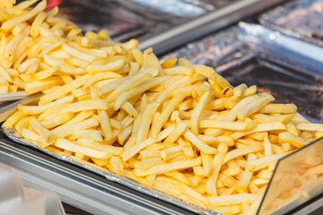 Close-up of French fries in a cafeteria