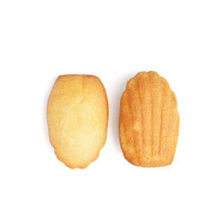 Delicious Madeleine cookies on white background