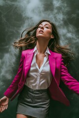 Photograph of woman in the crimson cardigan with the white shirt and grey skirt feeling relax and comfortable, look like she can float