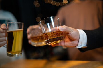 Celebrate whiskey on a friendly party in restaurant