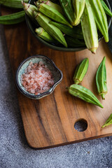 Raw bamia or okra vegetable cooking