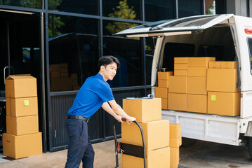 Asian courier delivery man searching the address on digital tablet.  near van outside the warehouse.