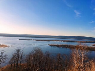 Obraz premium sunset over the river