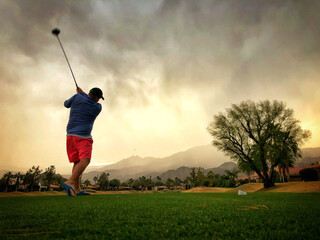 Golfer at sunset in Palm Springs California 