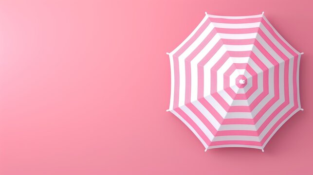 A colorful beach umbrella provides shade as visitors relax and enjoy the warm sun on a sandy beach, creating a perfect vacation atmosphere