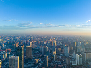 Naklejka premium Aerial view of shanghai skyline and huangpu river at sunrise