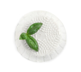 Fresh ricotta (cream cheese) and basil isolated on white, top view