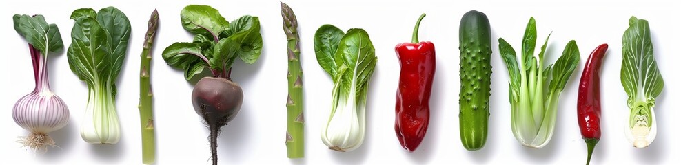 A row of vegetables including asparagus, beets, and baby bok choy on a white background.