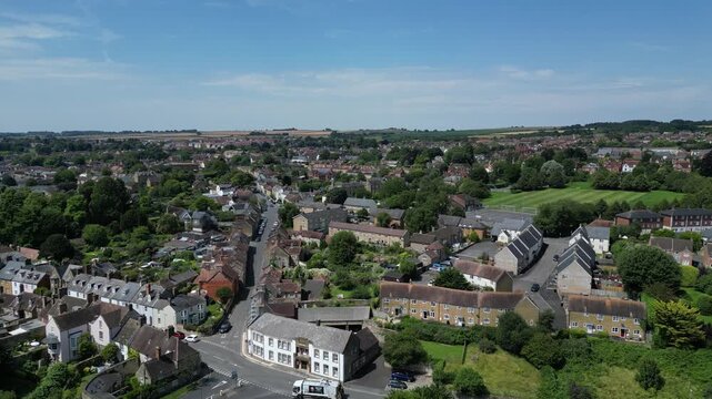 Sherborne, Dorset, England: DRONE VIEWS: Shows the south-east of the town of Sherborne including houses and roads. Sherborne is an affluent market town and popular UK tourist destination (Clip 2).