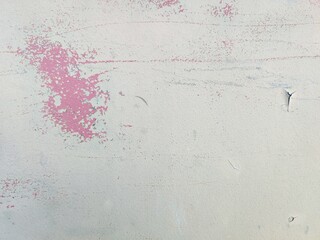 scratched surface with peeling paint, revealing subtle textures and faded colors