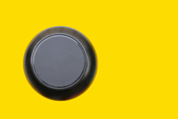 Whey protein powder on yellow background.