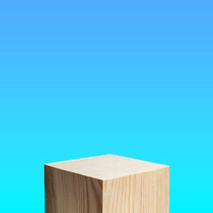 wooden square podium  with blue background