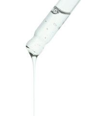 Dripping cosmetic serum from pipette isolated on white