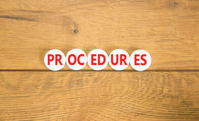 Procedures symbol. Concept word Procedures on beautiful white pill. Beautiful wooden background. Business procedures concept. Copy space.