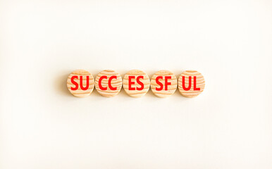 Successful symbol. Concept word Successful on beautiful wooden circles. Beautiful white background. Business successful concept. Copy space.