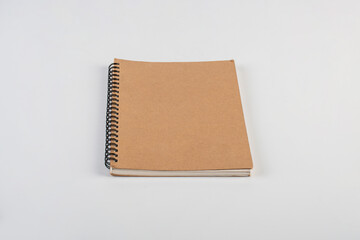 Brown notebook on white background