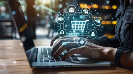 E-commerce concept with hands typing on laptop and shopping cart icon hologram floating above the keyboard