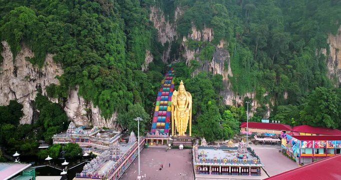 Caverns vast with ceiling high, temple &rsquo;neath Malaysian open sky, aerial