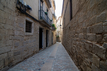 Narrow alley in historic Girona's old town