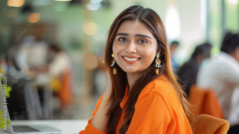 Wall mural Young indian female corporate employee smiling