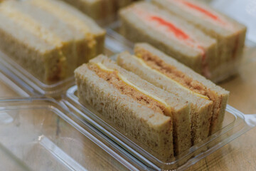 Mini Club Sandwich with chicken beacon ham, Egg Salad Cold Cuts Brioche Sandwiches