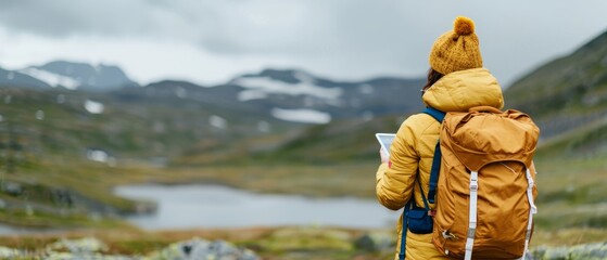 solo female backpacker with map exploring rugged mountain landscape, scenic view, cloudy sky, adventure travel, hiking, trekking, outdoor recreation, 
