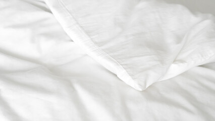 Obraz premium Smooth white bedsheet background, soft texture, clean and minimalist style.