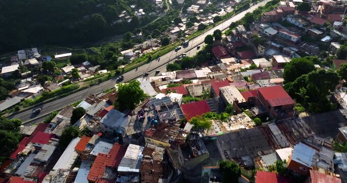 Flying Above Slum Houses In Favela On Hill Near City Of Caracas In Venezuela. drone flyby shot