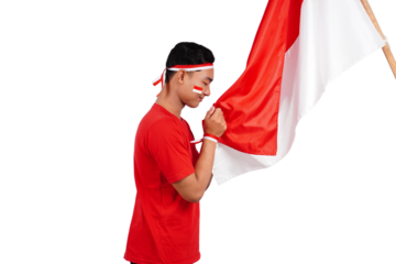 An Indonesian man giving salute to celebrate Indonesia's independence day on 17 August isolated transparent