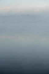 Fototapeta premium Morning fog in the river