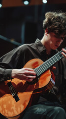 A man plays the guitar at the International Guitar Festival.