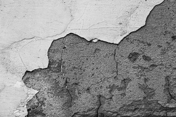 Obraz premium Old wall with cracked stucco. Weathered rough surface. Vintage texture great for background and design.