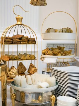 Display of Malay traditional festive food namely nasi impit, ketupat, lepat lui, burasak, ketupat palas and lemang.