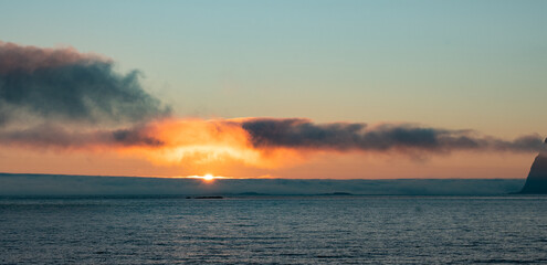Dramatic colorful evening sky during the midnight sun in the Lofoten, Northern Norway