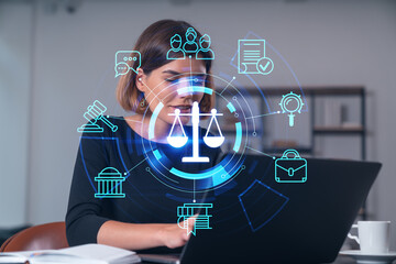 Woman working on laptop with digital justice icons overlayed.