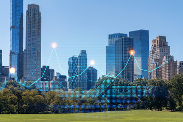 Digital graph overlay on city skyline with skyscrapers and greenery.