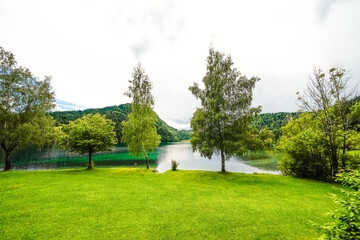 Landscape at Hintersteiner See near Scheffau in Tyrol. Idyllic nature at the mountain lake in the Wilder Kaiser nature reserve in Austria.
