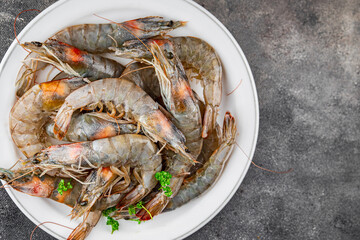 shrimp raw seafood prawns natural food fresh appetizer meal food snack on the table copy space food background rustic keto or paleo diet Pescetarian