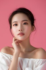 Beautiful Asian Woman Posing with Pink Background
