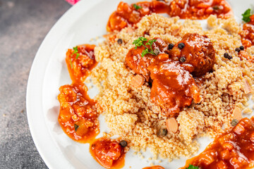 couscous with meat balls vegetable sauce tasty fresh meal food snack on the table copy space food background rustic top view keto or paleo diet