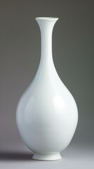 Elegant white ceramic vase with a narrow neck and bulbous body on a gradient gray background.