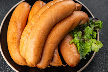 smoked sausages meat pork or chicken, turkey fresh meal food snack on the table copy space food background rustic top view