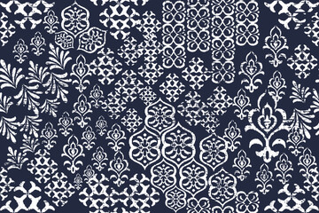 patchwork Ikat paisley embroidery on the fabric in Indonesia, India, and Asian countries. geometric ethnic oriental seamless pattern.Aztec style. illustration. design for texture, fabric, clothing