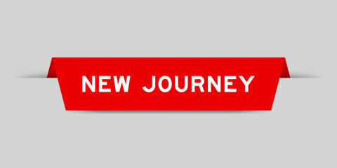 Red color inserted label with word new journey on gray background