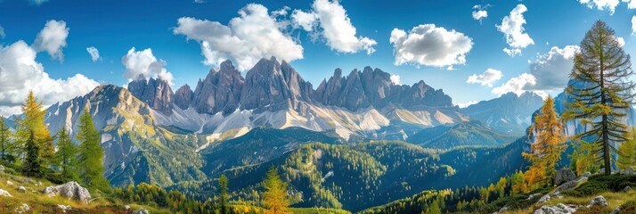 Breathtaking panoramic view of Italian Dolomites in autumn. Majestic mountains, colorful trees, blue sky and white clouds create a stunning landscape.