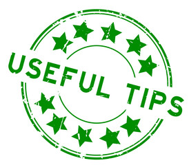 Grunge blue useful tips word with star icon round rubber seal stamp on white background