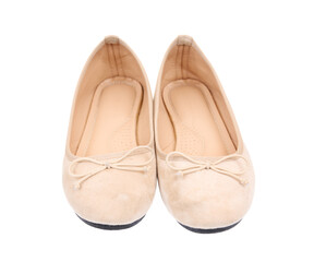 Pair of beige flat shoes isolated on white background. Elegant ballet flats.